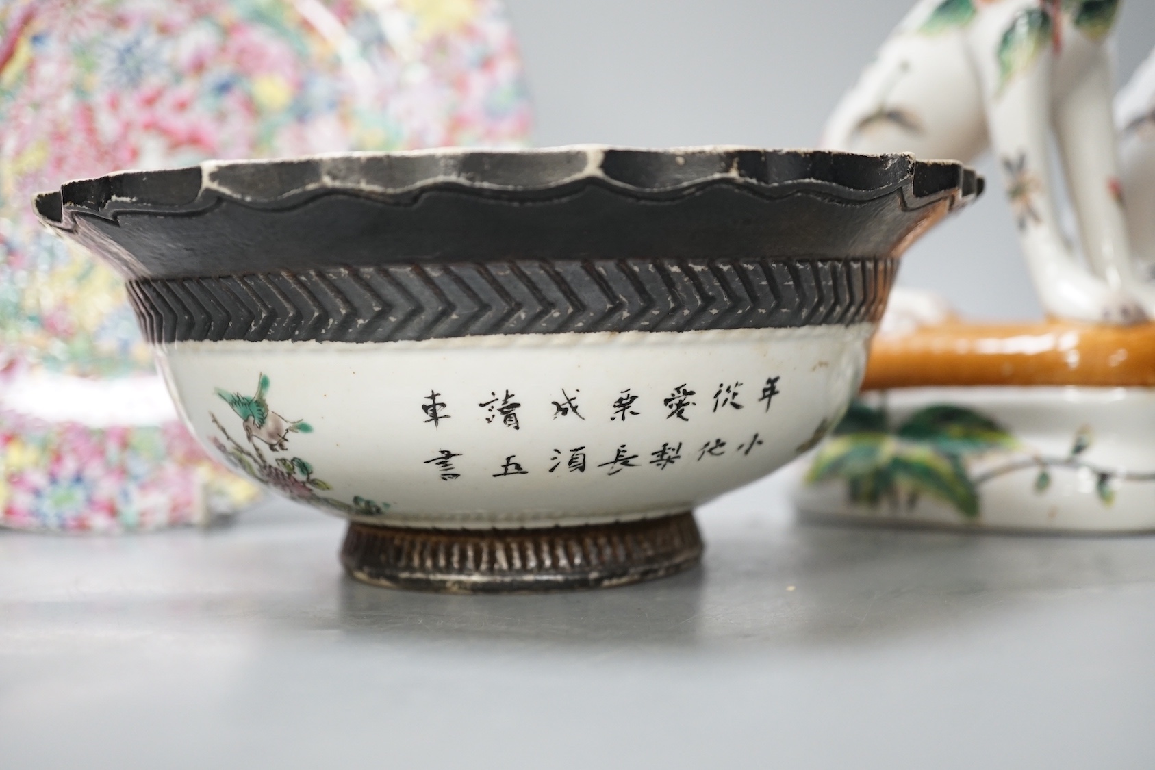 A Chinese porcelain bowl, brush pot, plate and a pair of dogs